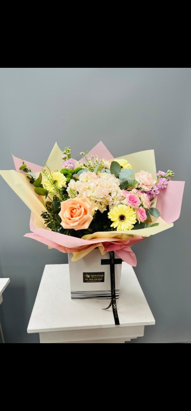 Bouquet of white oriental lily, Lilac, yellow tara roses, celosia, alstromeria, cream hypericum and delistar blooms