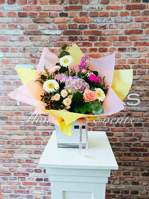 Bouquet of white oriental lily, Lilac, yellow tara roses, celosia, alstromeria, cream hypericum and delistar blooms