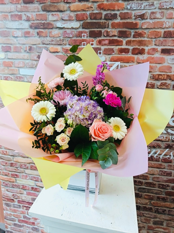 Bouquet of white oriental lily, Lilac, yellow tara roses, celosia, alstromeria, cream hypericum and delistar blooms