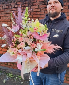Bouquet of red naomi roses, purple trachelium, viburnum snowball and deep pink Oriental Lilies, mixed with foliage